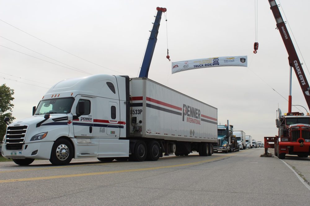 CHRIS GAREAU THE CARILLON
Steinbach-based Penner International sent trucks to the 2024 Law Enforcement Torch Run Truck Ride that started in Ile des Chenes and made its way around the Perimeter Highway to raise funds and awareness for Special Olympics Manitoba.
