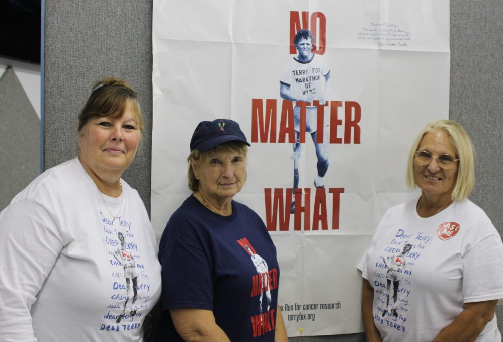 GREG VANDERMEULEN THE CARILLON
Vassar Terry Fox Run organizer for 44 years, Judy Preteau is flanked by her nieces, Gina Davis and Karen Theriault, both participants for nearly all those years as well.