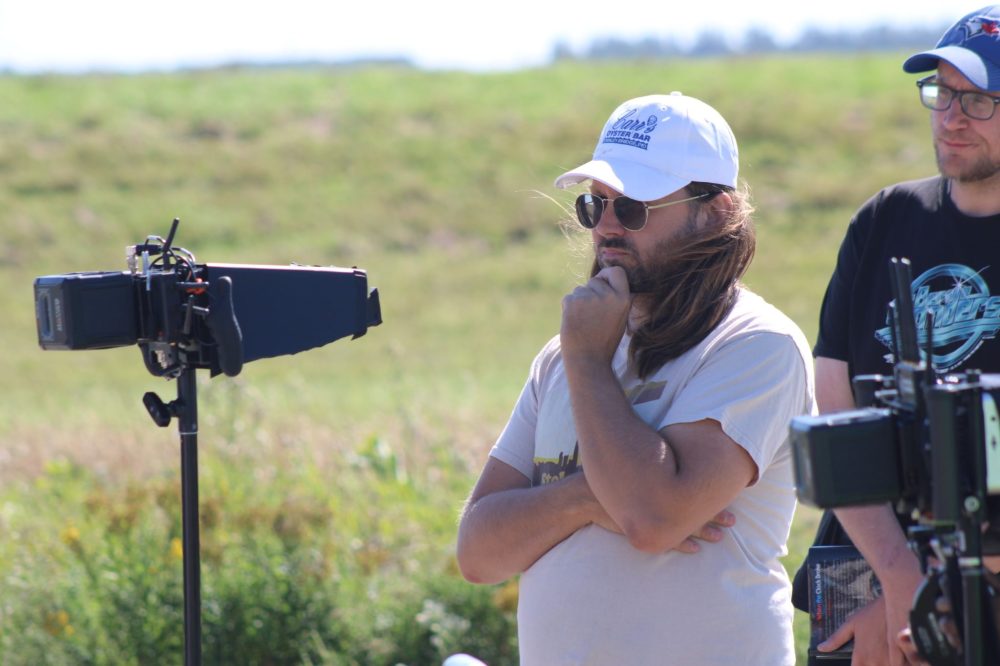 GREG VANDERMEULEN THE CARILLON
Writer and director Bob Kotyk watches a scene through the monitor while on location in Emerson.