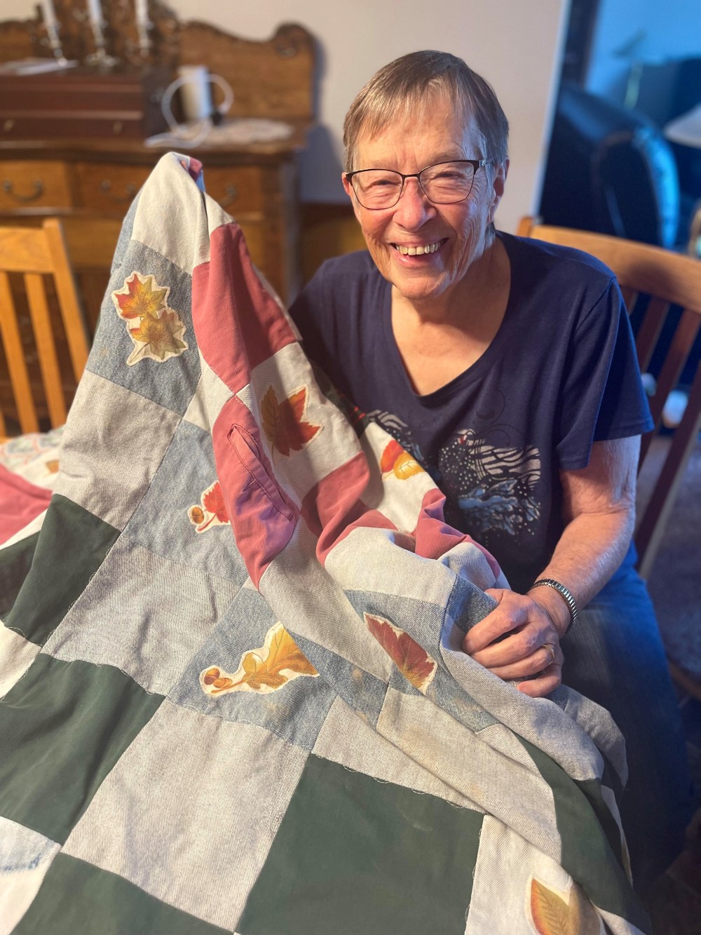 LORI PENNER THE CARILLON
Ruth Stoesz with one of many of her jean blankets.