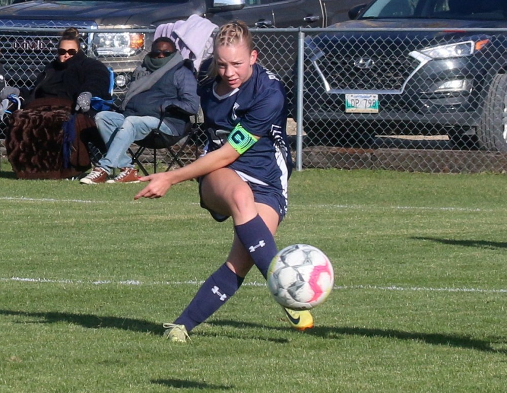Serena Negrich hammers home a goal during Providence's 5-0 victory over St Boniface Oct. 24. Providence and Brandon have been perfect against the rest of the conference this season, and are favoured to eventually play in the Manitoba Colleges Athletic Conference final Oct. 25. (Cassidy Dankochik The Carillon)