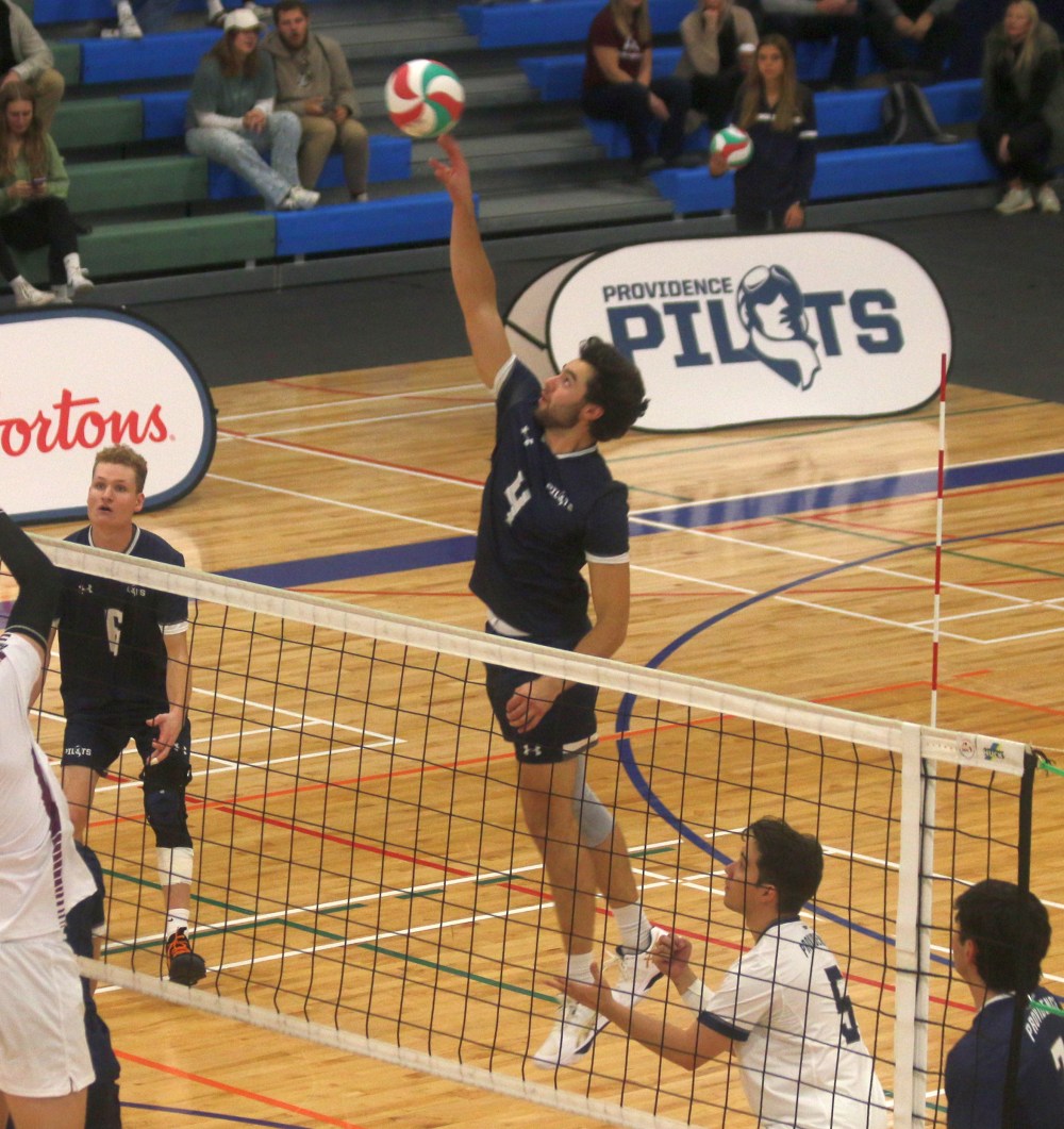 Both of Providence's volleyball teams came away with straight sets victories over Assiniboine in their Manitoba league opener. (Cassidy Dankochik The Carillon)