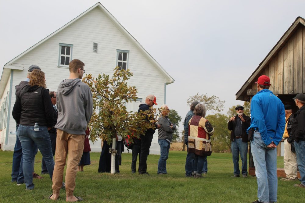CHRIS GAREAU THE CARILLON
Historians Conrad Stoesz (right with red hat) and Ernie Braun (immediately left of Stoesz) describe the history of Chortitz Church during Oct. 10’s Mennonite East Reserve tour. The West Reserve tour is on Oct. 22.