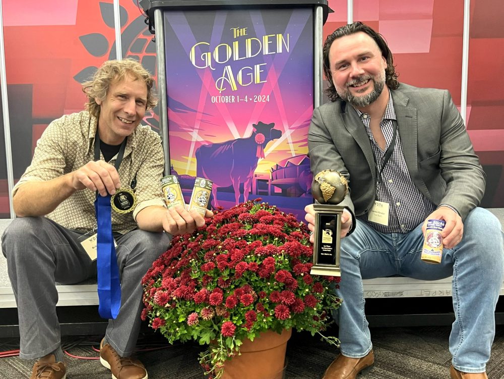 SUPPLIED
Rob Sengotta and Landon Kroeker, owners of Von Slick’s show off their product and their trophies at the World Dairy Expo.