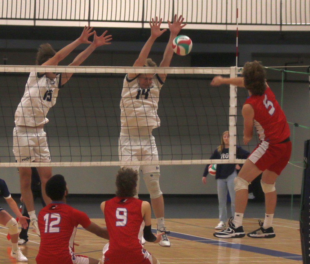 The Providence Pilots men's and women's teams took care of business against St Boniface Nov. 9 in Niverville, with both teams coming out with victories. (Cassidy Dankochik The Carillon)