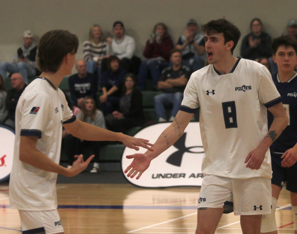 The Providence Pilots men's and women's teams took care of business against St Boniface Nov. 9 in Niverville, with both teams coming out with victories. (Cassidy Dankochik The Carillon)