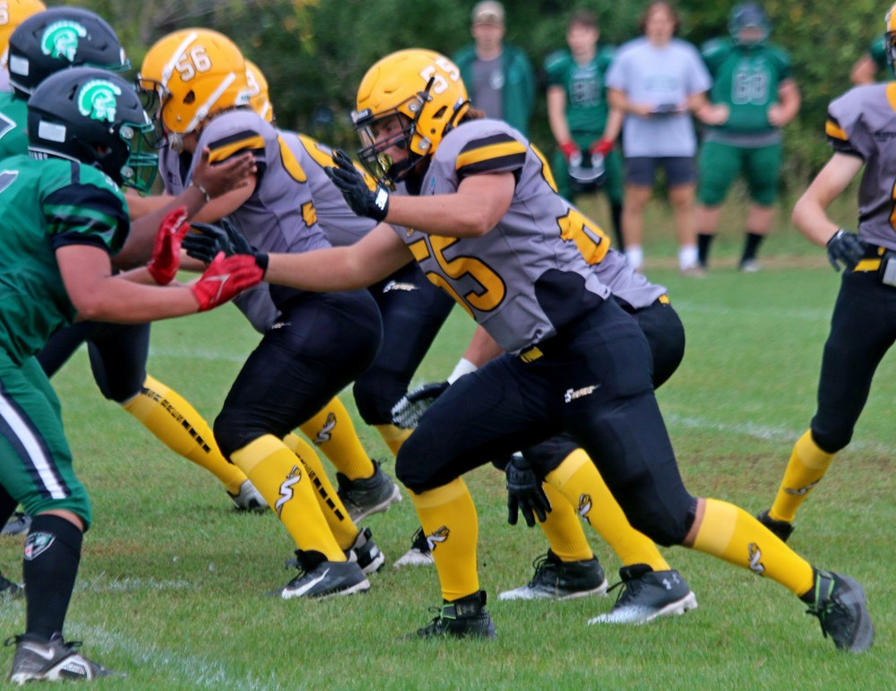 Jack Leppelmann was awarded the SRSS football program's Legacy Award. Leppelmann was set to have an outstanding season at offensive line, before a pair of concussions cut his year shot. Undeterred, he embraced a coaching role with the team. (Cassidy Dankochik Carillon Archives)
