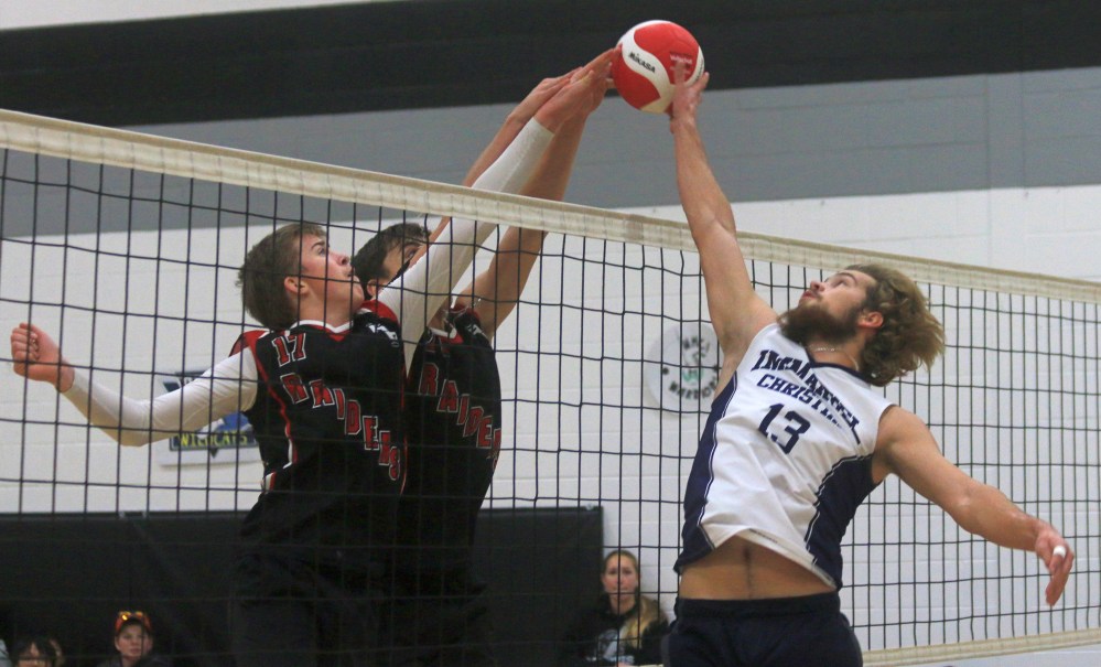 Players from Goose Lake and Emanual Christian joust for the ball during the AA boys varsity provincial championship third place game in Morris (Cassidy Dankochik The Carillon)