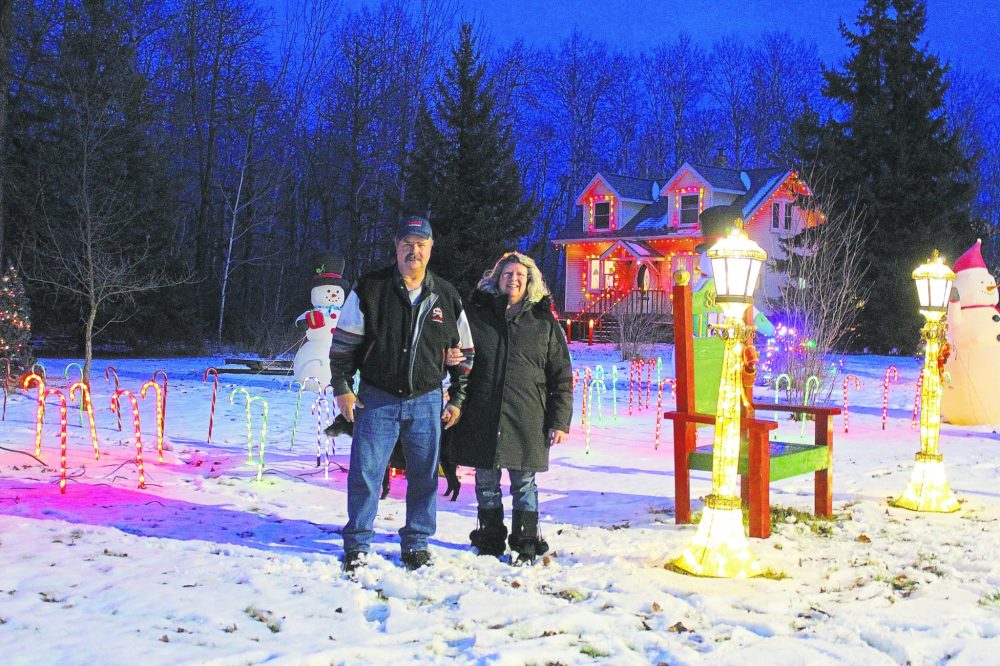 CHRIS GAREAU THE CARILLON
Ken and April Boer are hosting their final Christmas light show north of Richer after 27 years and multiple generations of families dazzled by the display and stopping by to see Santa.