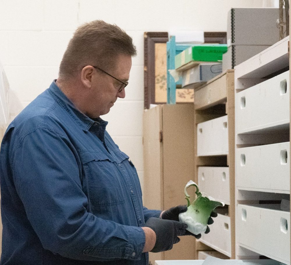 SVJETLANA MLINAREVIC THE CARILLON
Mennonite Heritage Village assistant curator Garth Doerksen shows a porcelain pitcher in the museum's vault.