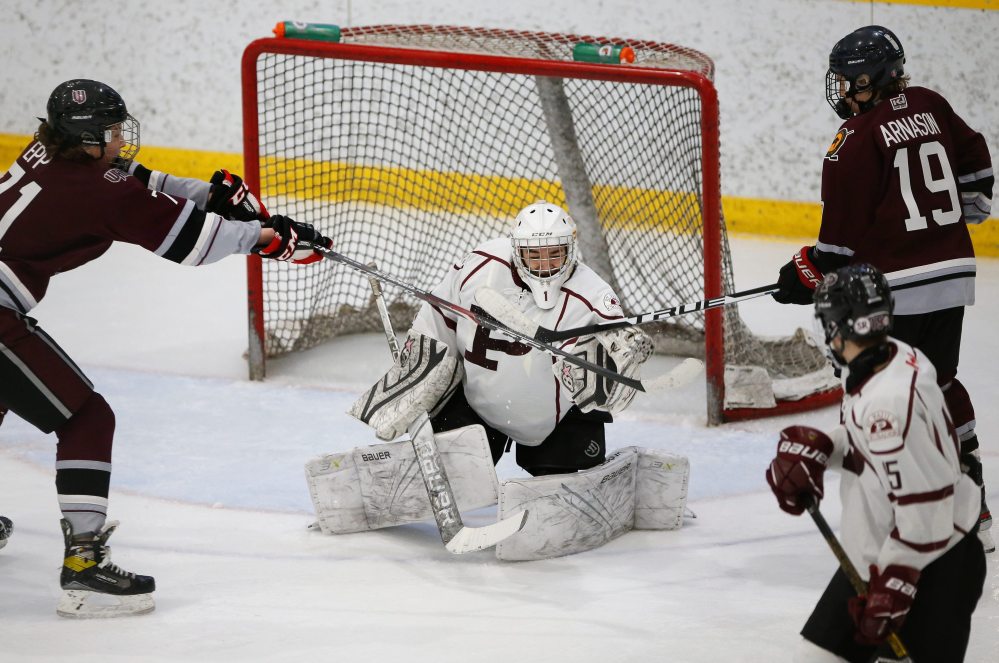 St Paul’s Crusaders goaltender River Leslie-Toogood (1) stops the shot as Westwood Warriors’ Campbell Epp (71) and Tristan Arnason (19) attempt to deflect the puck in the Manitoba Provincial AAAA Championship game in Selkirk Monday, March 14, 2022. St Paul’s defeated Westwood for the championship.
JOHN WOODS / WINNIPEG FREE PRESS