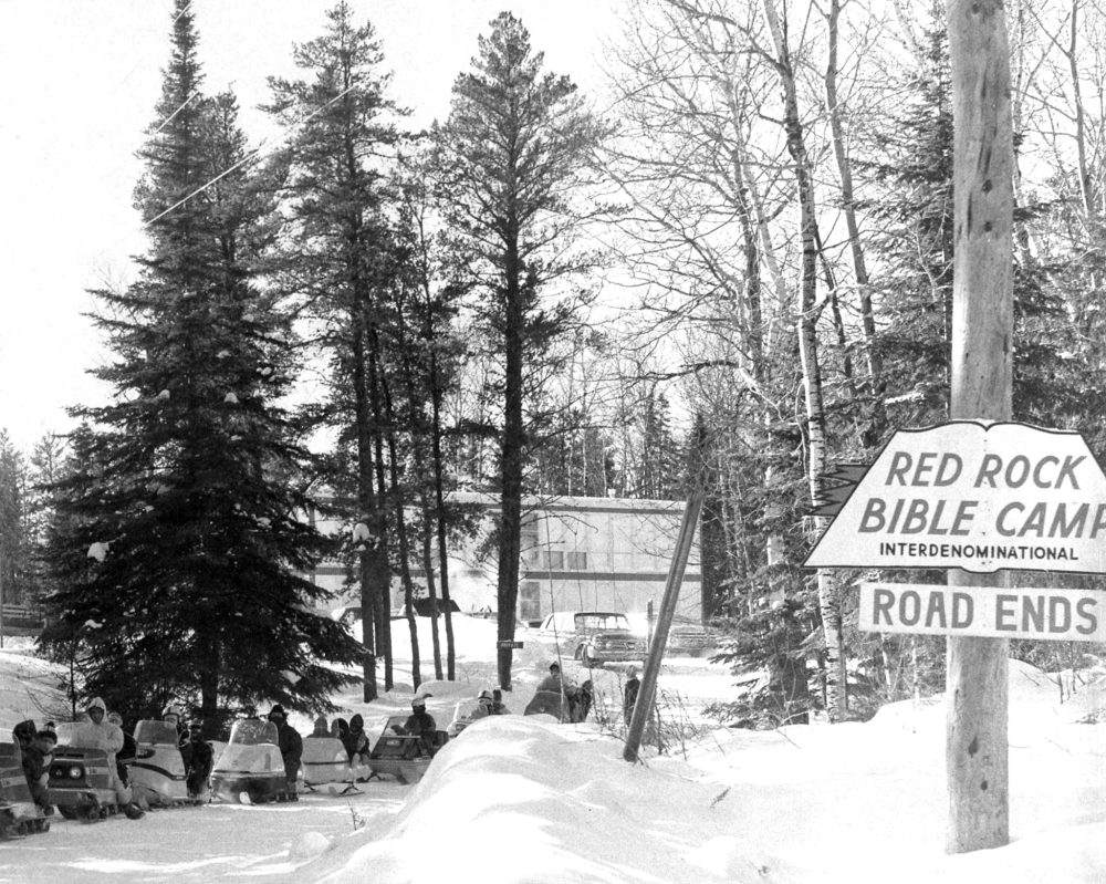 CARILLON ARCHIVES
A dozen snowmobiles are lined up, ready to hit the trail during a two-day, father-son camping retreat at Red Rock Bible Camp in January.