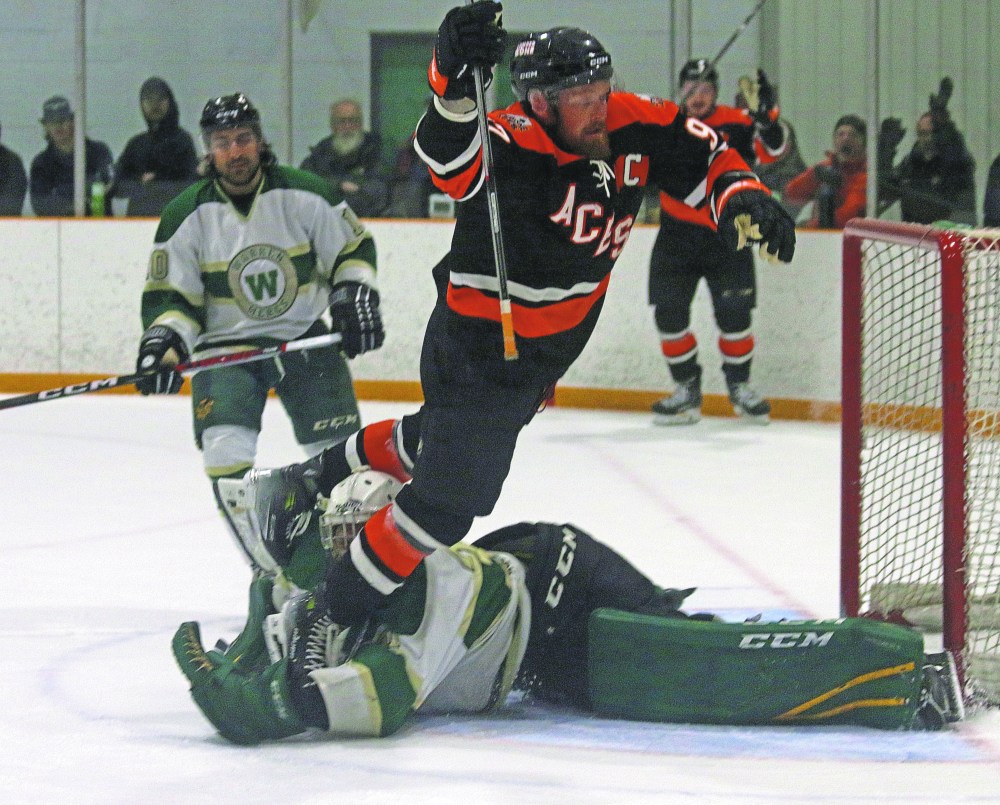 Brenden Walker did his best Bobby Orr impression after scoring the game-winner for Ste Anne in game two of the SEMHL finals. (Cassidy Dankochik The Carillon)