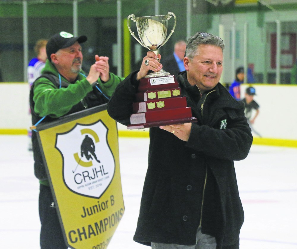 Ralph Collette, the long-time coach and general manager of the St Malo franchise, celebrates with the CRJHL championship. It's the franchise's first victory since splitting off from the KJHL in 2018. (Cassidy Dankochik The Carillon)