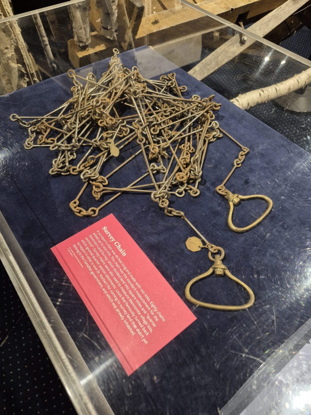 Survey chain used to divide land into square miles and quarter sections, circa 1870s.