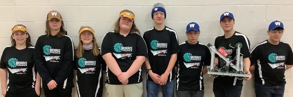 JP JAMIESON
On the left is team Phillip (gold hats): Tennyson Janke, Zajac St. Godard, Hannah Klassen, Carter Evenson, and team Blue Bombur (blue hats): Cody Dueck, Josh Hildebrandt, Kayden Grattan, Andrew Hildebrandt. Team Blue Bombur is going to the VEX Robotics World Championship in May.
