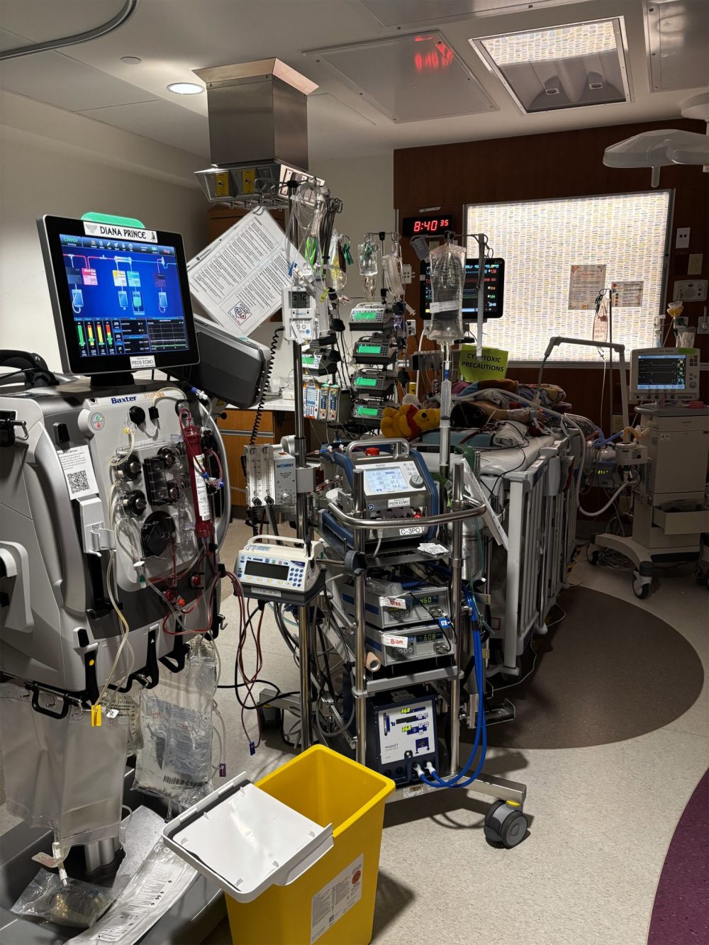 Submitted by Ashley Hernandez
The machines at Stollery Children’s Hospital in Edmonton that are keeping Aliyah Hernandez alive as she sleeps in the background. The 18 month old has neuroblastoma, a cancer that has grown behind her heart and lungs. The cancer develops from immature nerve cells found in several areas of the body. One in 7,000 children are affected by the cancer.