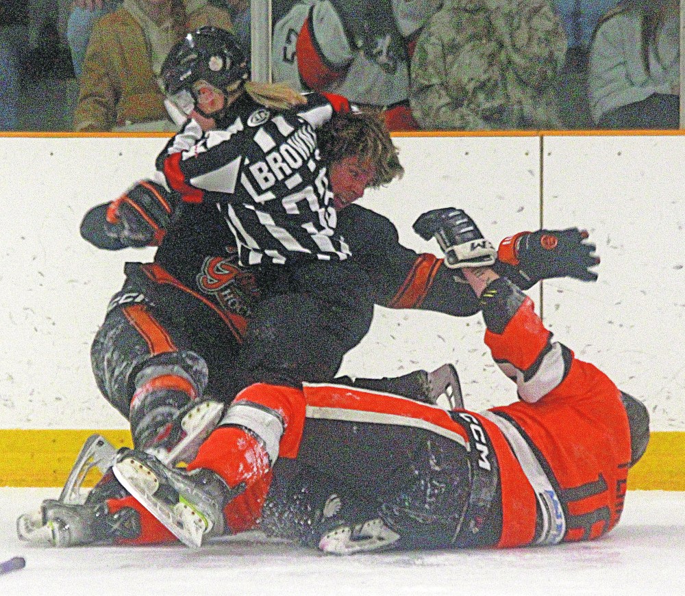 With scrums breaking out all over the ice, referee Kyana Brown had to get involved in breaking up this scuffle following the end of game three between Ste Anne and East St Paul in the Hanover Tache Junior Hockey League playoffs. Ste Anne would win game three and the series, advancing to play Springfield in the quarterfinals. (Cassidy Dankochik The Carillon)