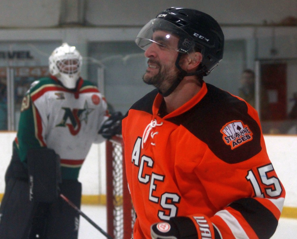 Stephane Pattyn drew laughs from everyone on and off the ice at the Maurice Chaput Arena during game one of the Aces Series against Ile des Chenes,after tipping home a goal with a high stick held comically above his head. (Cassidy Dankochik The Carillon)