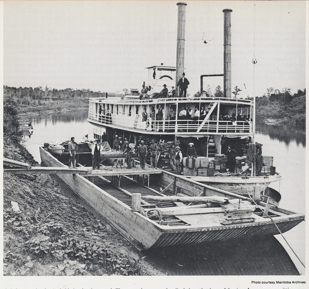ARCHIVES OF MANITOBA
River steamer Dakota with a flatboat, which brought many Mennonites to Dufferin. Often luggage and passengers traveled in the flat boats.