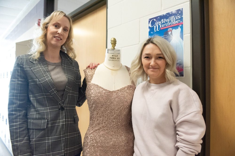 SVJETLANA MLINAREVIC THE CARILLON
Ashley Booth Gingras (left) and Katrina Drinevski help students get dressed for their graduations at Cinderella's Wardrobe.