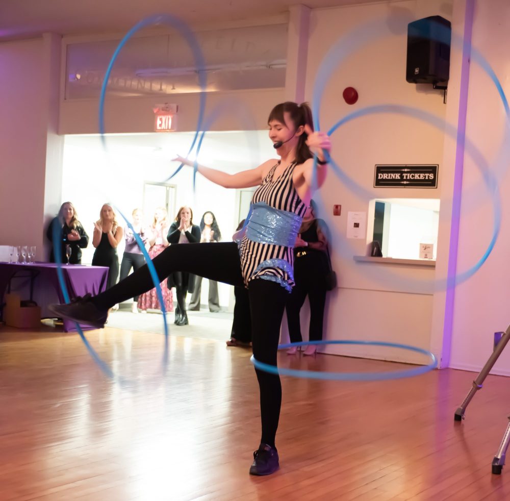 SVJETLANA MLINAREVIC THE CARILLON
Entertainer Sarah Teakle entertains the crowd with her hula hoops during Agape House's Purple Gala at Friedensfeld Community Centre on March 7, 2025.