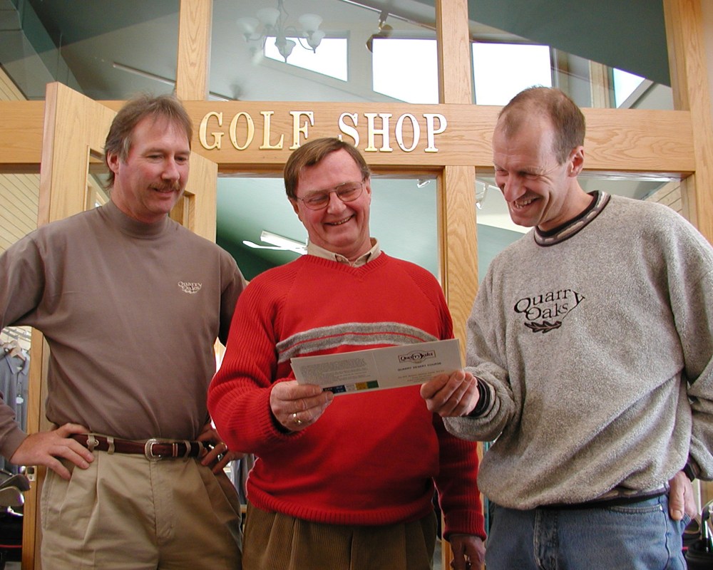 Golf professional Robin Henderson, left, Dave McDonald, one of four new owners, and greens superintendent Wilf Peters make plans for the upcoming season at Quarry Oaks.