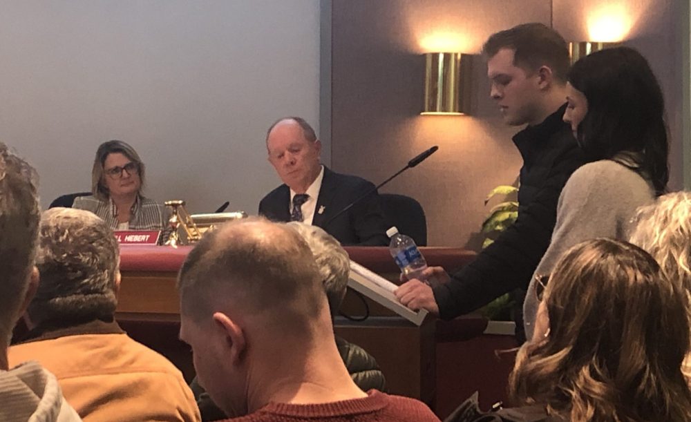 GREG VANDERMEULEN THE CARILLON
Brandon Thiessen and his fiancée Taylor speak to council as neighbours look on.