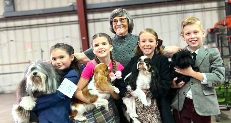 submitted
Jody Davidson with some of the kids she helped with dog training.