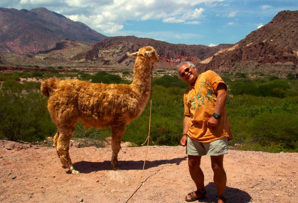SUPPLIED
Philippe Sabourin hams it up with a llama on a South American trip.