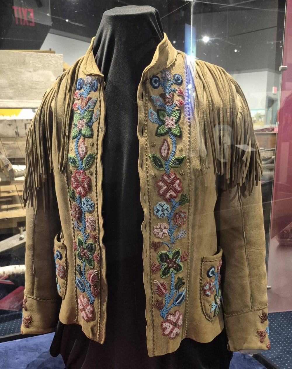 Beaded hide jacket in MHV 150th exhibit on loan from The Manitoba Métis Federation.