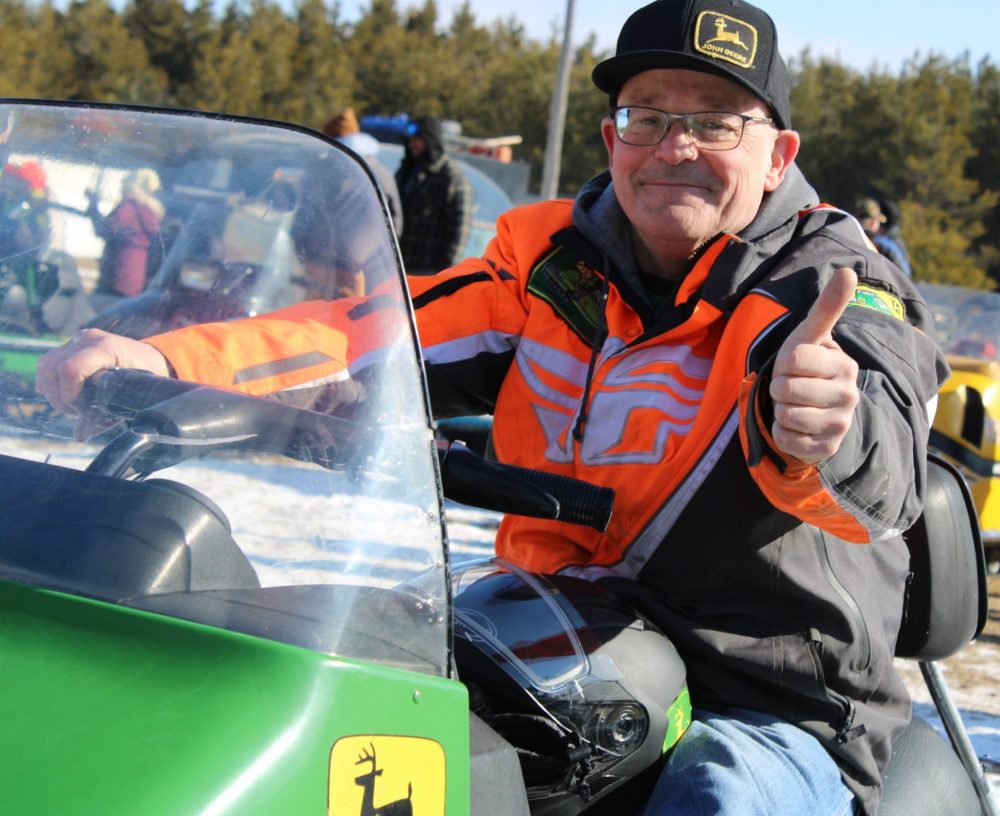 GREG VANDERMEULEN THE CARILLON 

Roger Cormier gives a thumbs up while astride his 1974 John Deere 600.