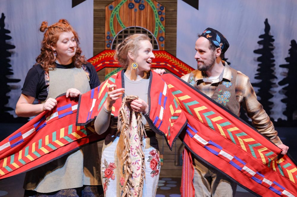 Photo by Leif Norman
Alanna McPherson, Emily Meadows, and Simon Miron act out a scene from Blue Beads and Blueberries. The Manitoba Theatre for Young People production will play in Steinbach on April 11.