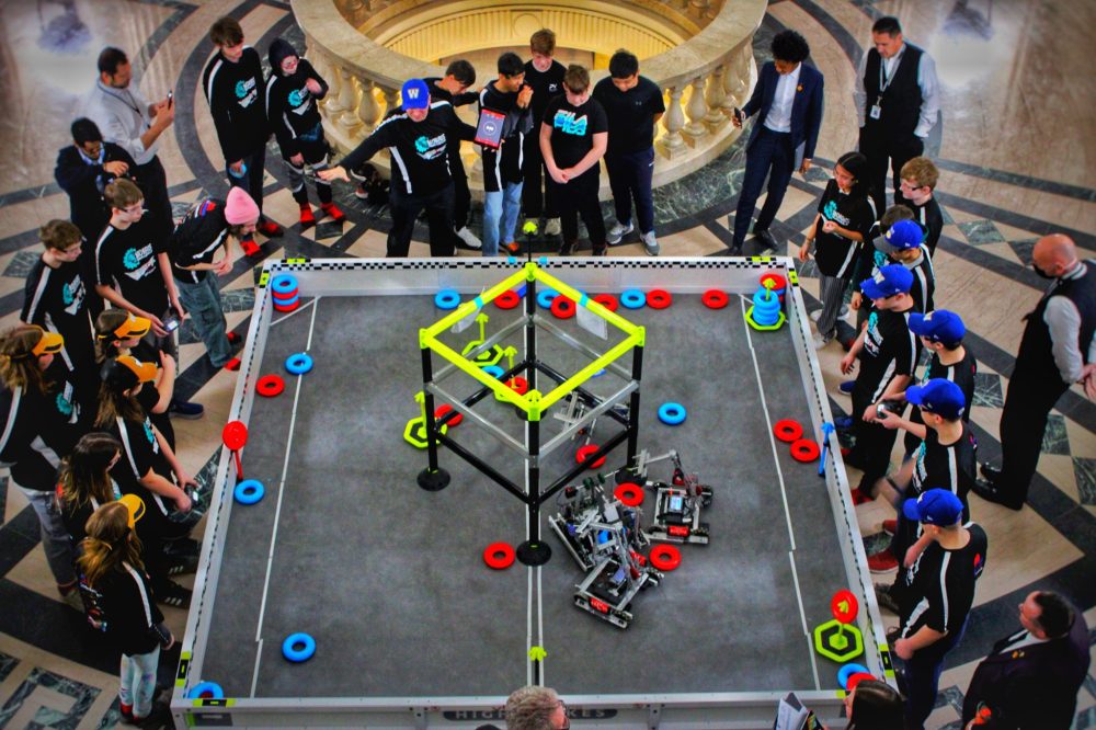 Photo by Taylor Friesen
Morris Robotics was invited to the Manitoba Legislature by Lauren Stone, MLA for Midland. The Deputy Premier of Manitoba Uzoma Asagwara, Minister of Education Tracy Schmidt, and the Minister of Innovation and New Technology Mike Moroz came out to see the demonstration on March 25. Morris Robotics Team Blue Bombur will be representing Manitoba at the VEX Robotics World Championship in Dallas, Texas, in May.