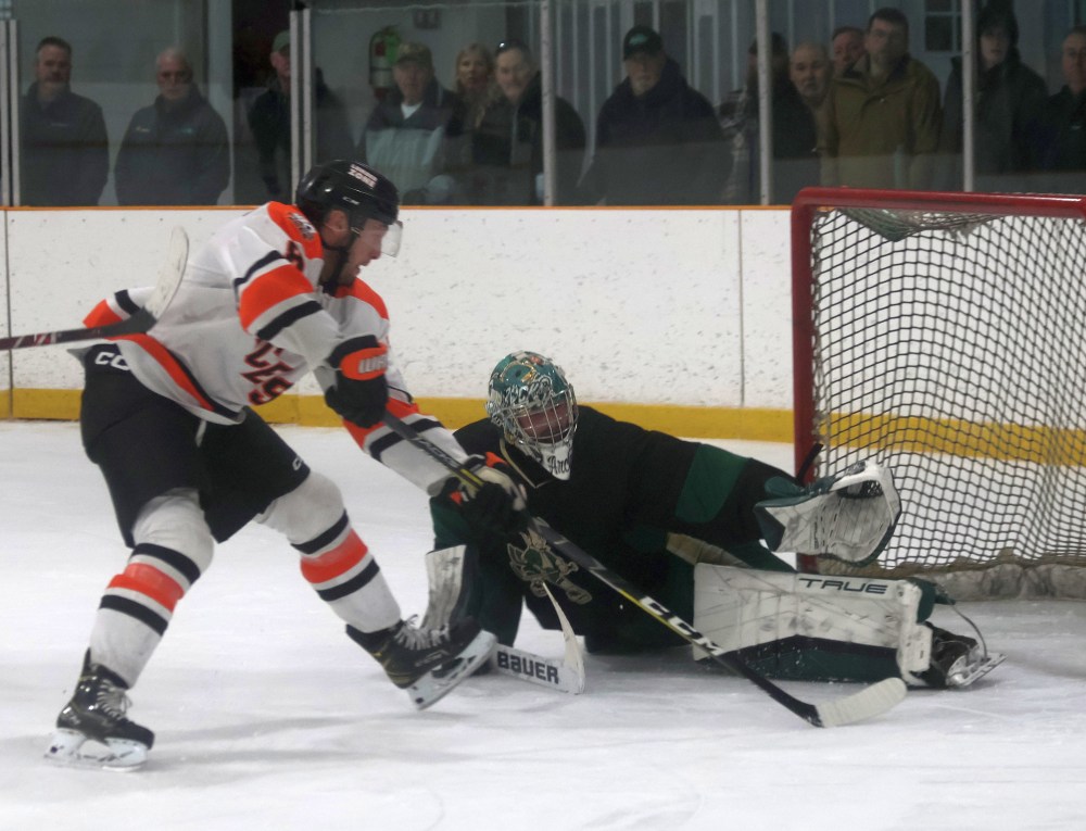 Caleb Paisley would get the puck across the line on this chance, but only after the net was knocked off, with Paisley using the newfound space to get the puck into the net. Referees were quick to disallow the goal. (Cassidy Dankochik The Carillon)
