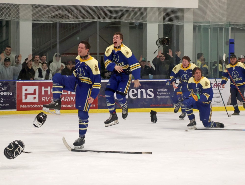 The Niverville Clippers poured out of their bench to celebrate winning the HTJHL championship March 26. (Cassidy Dankochik The Carillon)