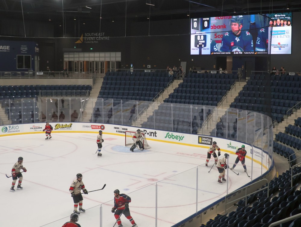 The SEC is hosting viewing parties for Jets playoff games, with over 300 people in attendance for game two April 21. The large screens showing the game didn’t stop rec hockey league action from continuing, with players on the ice pausing to watch the NHL game at key moments. Tickets for the viewing parties are $10, with $5 going to local charities. During games one and two the SEC also handed out a box of popcorn to everyone in attendance. (Cassidy Dankochik The Carillon)