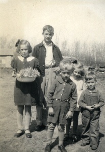 Rosengard children with Easter symbols in hand looking forward to Easter Sunday, April 21, 1946.