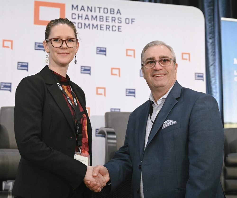 Supplied
Tessa Masi, left, is the executive director of the Steinbach Chamber of Commerce and recently became a board member for the Manitoba Chamber of Commerce. Here she shakes hands with Chuck Davidson, MCC President and CEO.