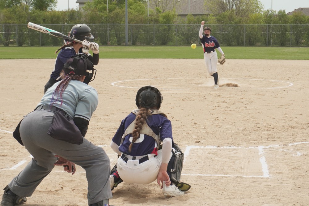 Pascale Kihn (centre) gets ready to catch the ball while Lola Kihn (right) pitches to a Landmark 96ers player on Wednesday, May 21. TONI DE GUZMAN THE CARILLON