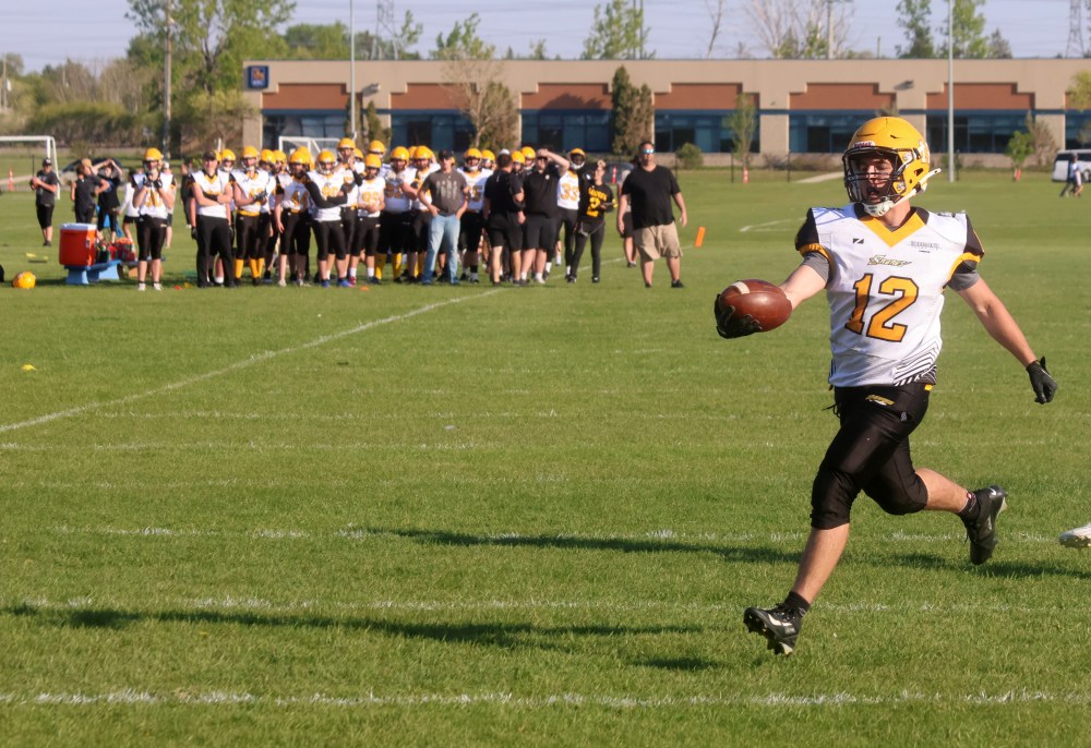 The SRSS Sabres (varsity and junior varsity) took on Grant Park for a pair of spring exhibition football games May 22. (Cassidy Dankochik The Carillon)