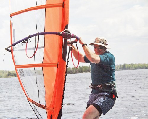 Mitch Toews, who started his season of sailing as soon as the ice went out April 2, goes for a Victoria Day cruise on Jessica Lake in the Whiteshell. (Carillon Archives)
