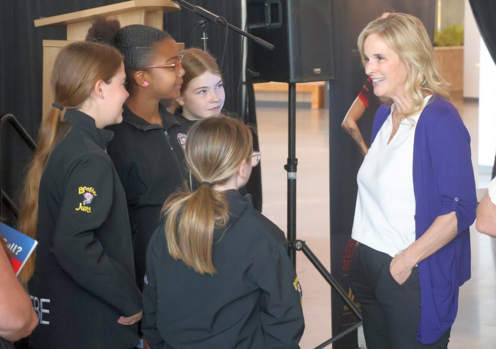 Jennifer Jones speaks with young curlers following a promotional event for the 2026 Players' Championship, which will be hosted in Steinbach. It's the first Grand Slam in Manitoba since 2018. Jones credited the Grand Slam for powering the growth of women's curling around the globe. (Cassidy Dankochik The Carillon)