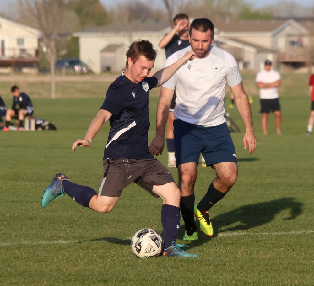 A pair of Hanover Soccer Club MMSL teams held a pre-season scrimmage in Steinbach May 8. The club's three teams' home schedules kick off in June. (Cassidy Dankochik The Carillon)