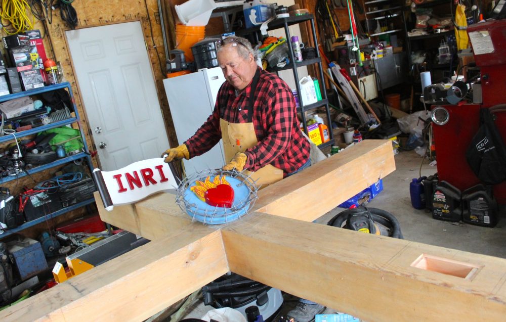CHRIS GAREAU THE CARILLON
Michel Rozière hard at work in his garage building a new cross to be displayed at a historic location between the new recreation centre and dog park in Lorette.