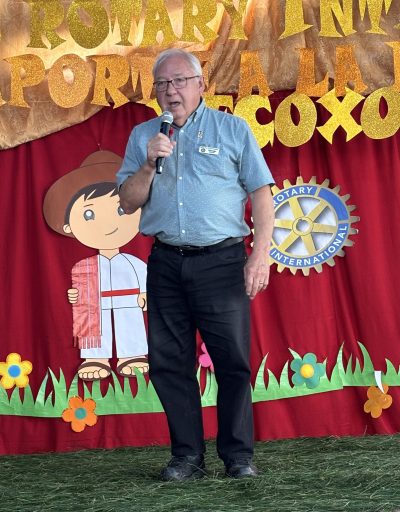 SUPPLIED
George Penner speaks at a ceremony in Guatemala.