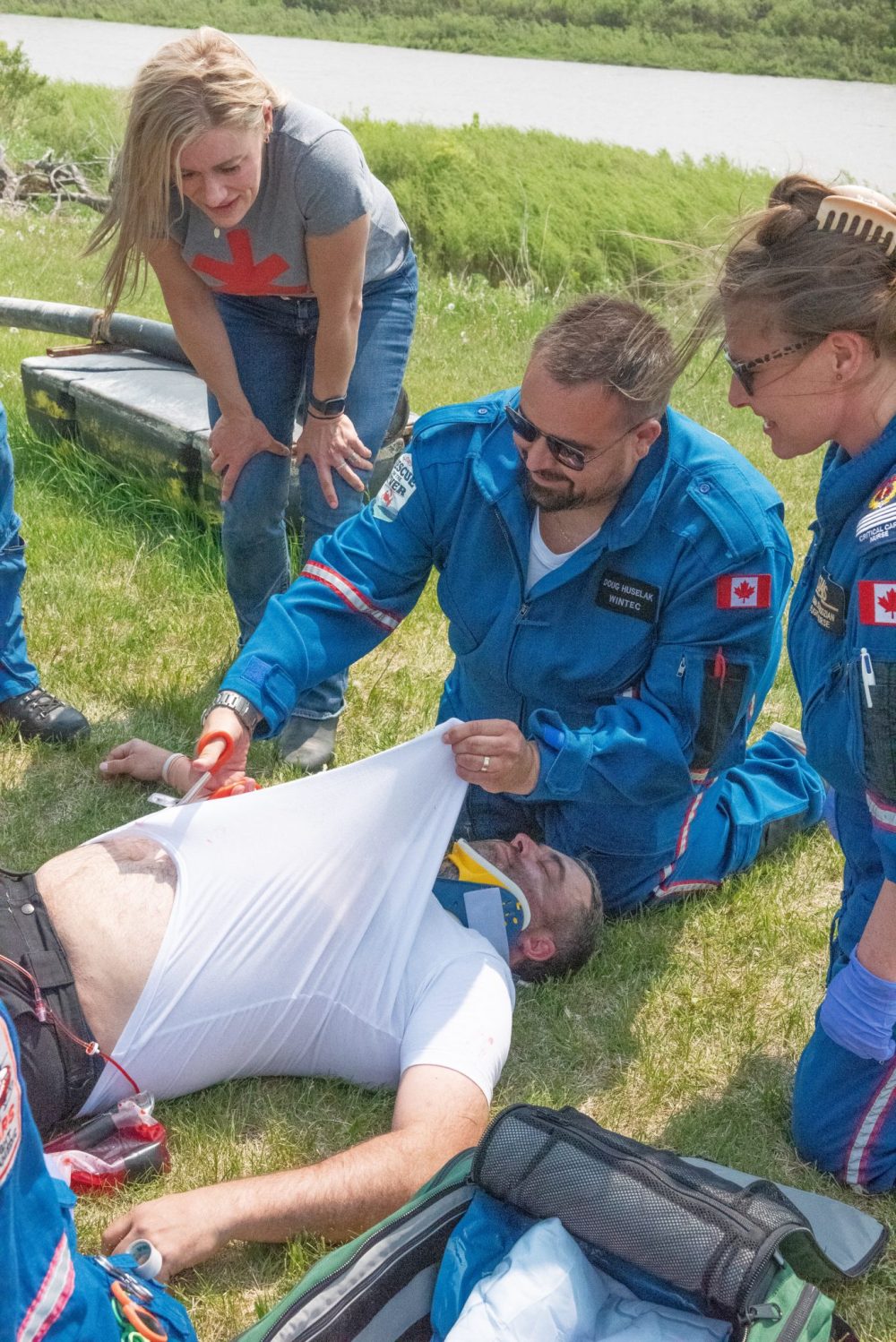 SVJETLANA MLINAREVIC THE CARILLON
Doug Huselak, president of Wintec Saddles, cuts the shirt off a STARS volunteer during an exercise for STARS Ambulance's Rescue on the River fundraising event at Kelburn Farms in Howden on May 29, 2025. The event saw three participants raise $50,000 each for STARS operations. In total, STARS raised $300,000 during the event and a fundraising gala later that evening.