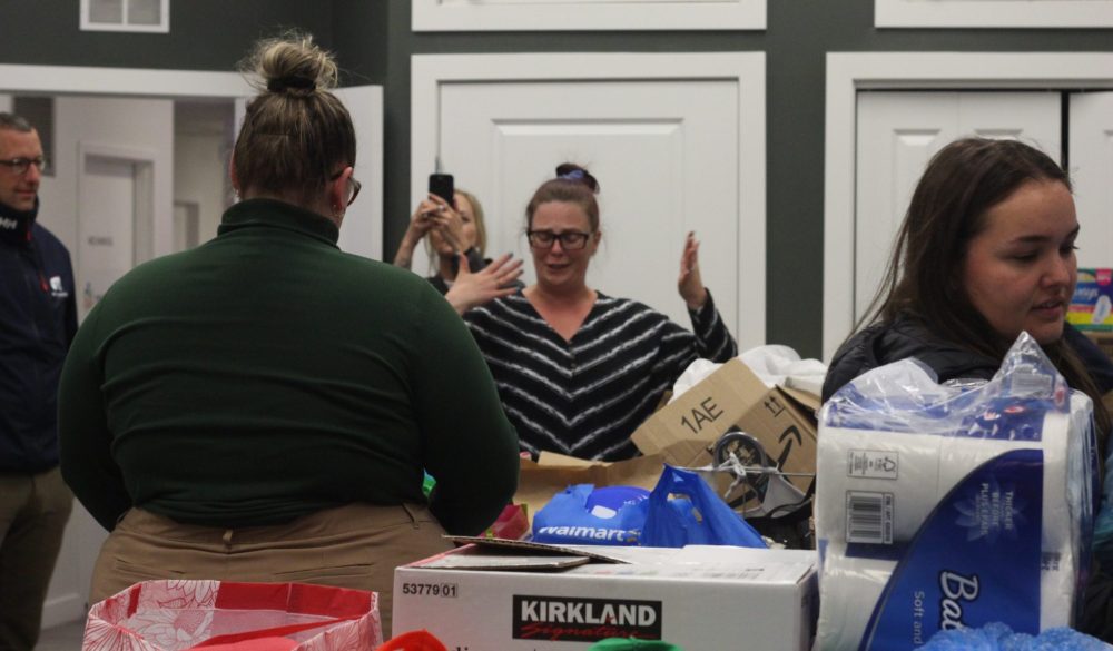 TONI DE GUZMAN THE CARILLON
Chelsea Fernstrom (middle), who has family evacuees staying at her place because of the wildfire near Creighton, a neighbouring community to Flin Flon, reacts to seeing the amount of donations.