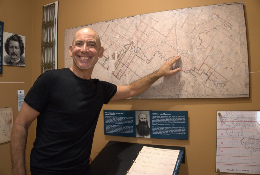 TONI DE GUZMAN THE CARILLON
Sol Desharnais points at the early Rat River settlement lot map at the new exhibit he curated at the St Pierre Jolys Museum on June 5.