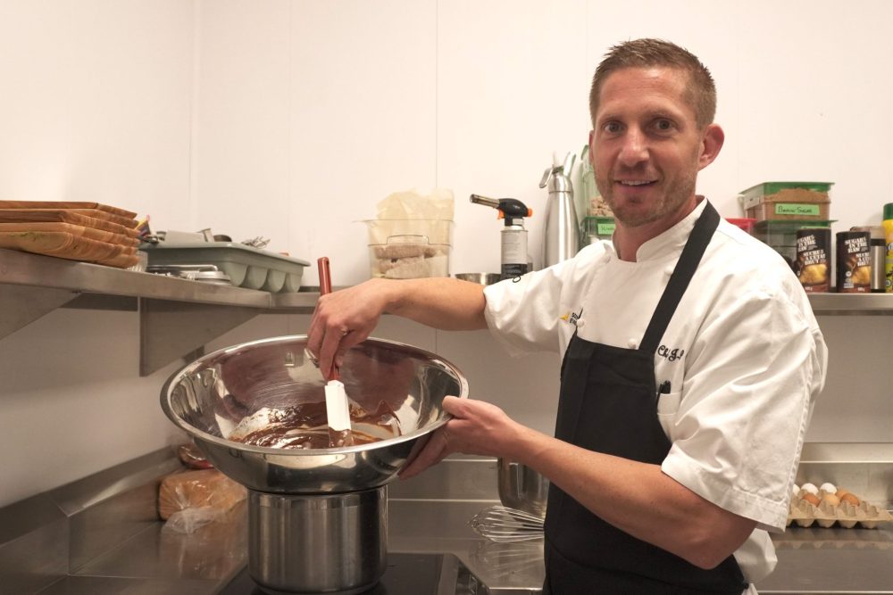 TONI DE GUZMAN THE CARILLON
JP Charpentier folds and prepares a chocolate mousse at the Southeast Event Centre kitchen on Monday.